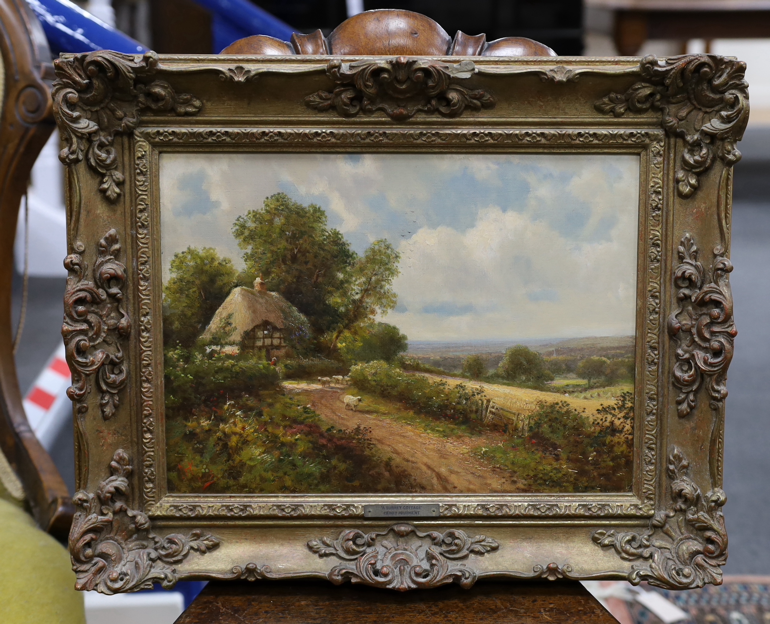 Henry Maidment (act. 1889-1914), oil on canvas, A Surrey cottage, monogrammed and dated, applied plaque to the frame, 27 x 37cm